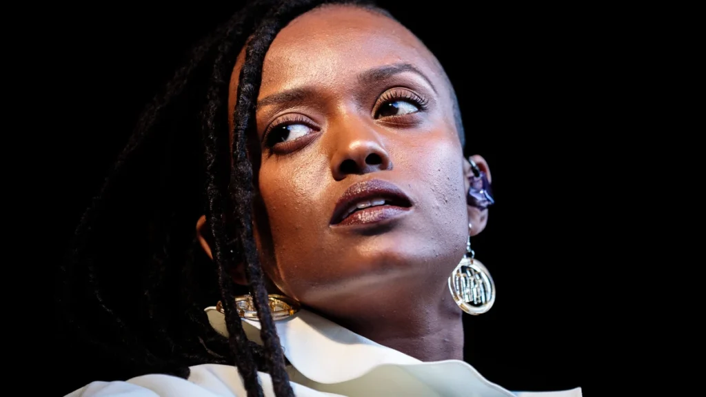 Close portrait of Kelela on stage looking to her left